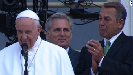 Pope Francis [left] with then-House Speaker John Boehner [right]; House Majority Leader Kevin McCarthy (R-CA) lurks in the background